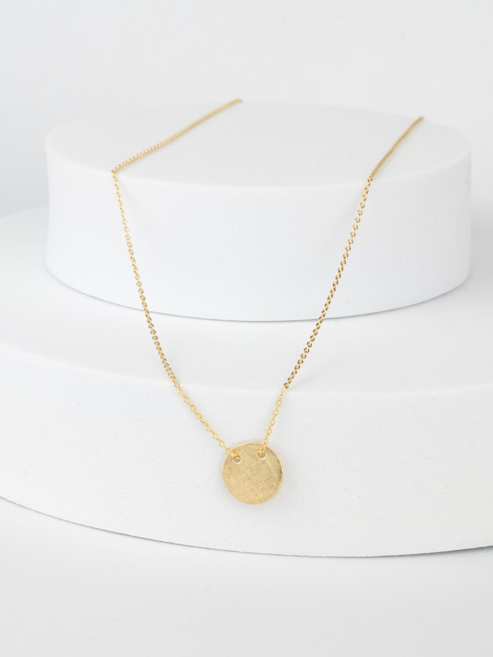 Necklace with disc pendant made from recycled gold